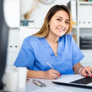 a medical assistant in her desk