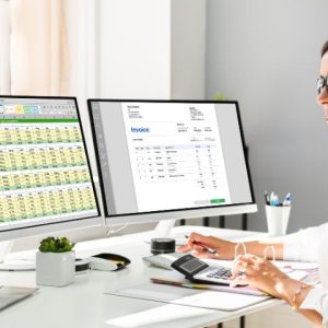 medical biller and coder working in office