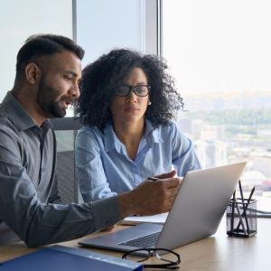 Business managers sitting at a desk