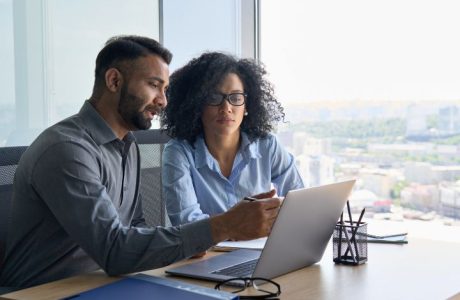 Business managers sitting at a desk