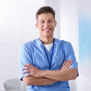Medical Assistant with arms folded
