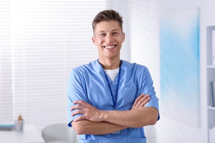 Medical Assistant with arms folded
