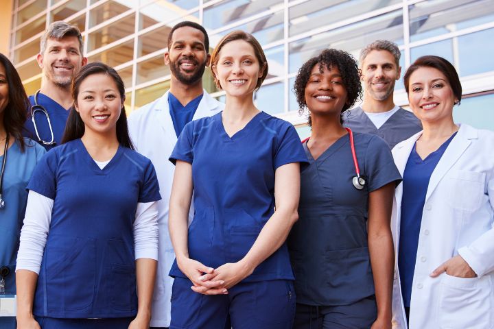 Medical Assistants standing and smiling