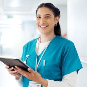 Medical assistant holding a clipboard