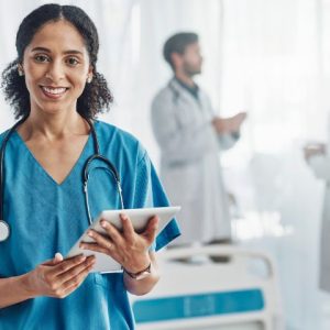 Vocational nurse holding a clipboard