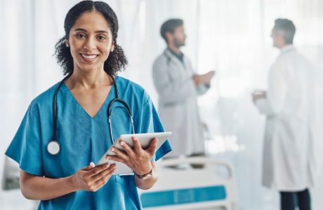 Vocational nurse holding a clipboard