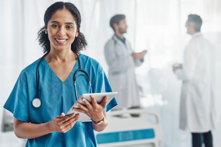 Vocational nurse holding a clipboard